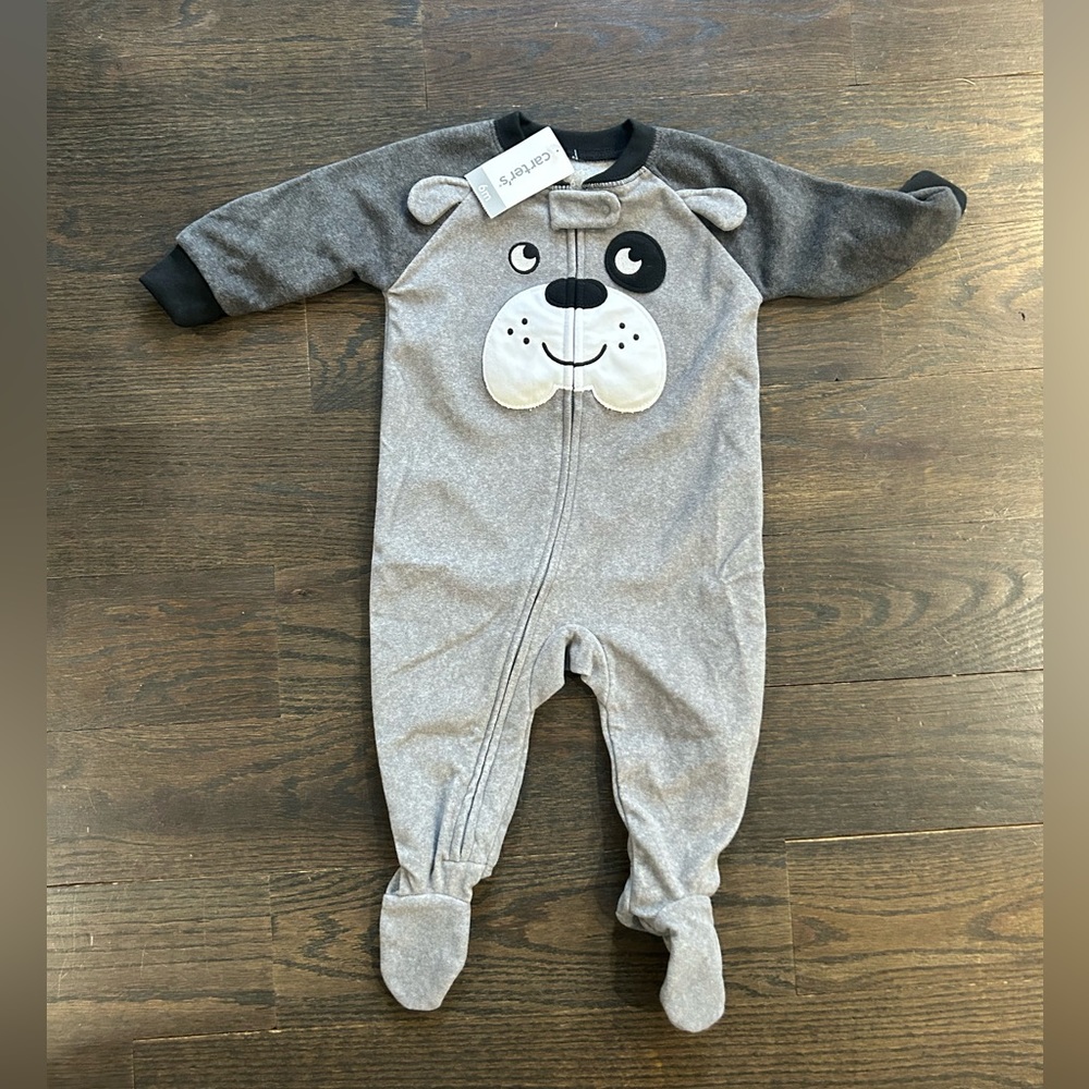 6 month boy PJs.  Carters. Brand new tags on. Zip front